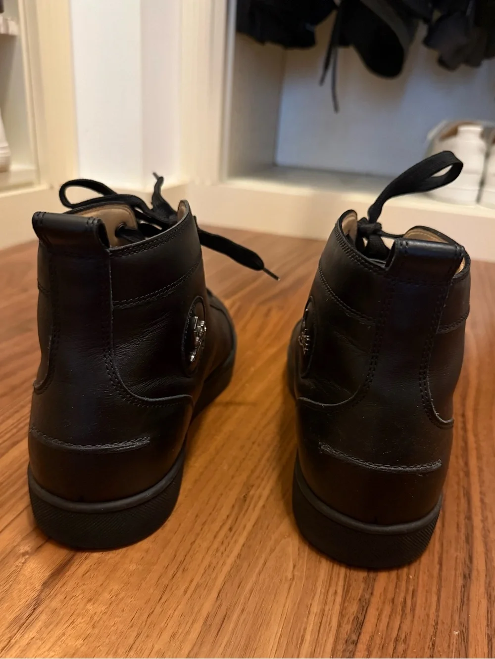 CHRISTIAN LOUBOUTIN Black High Top Calf Leather Sneakers